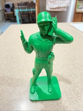 Toy Story Green Soldier holding  a Radio 7 1:2” Tall